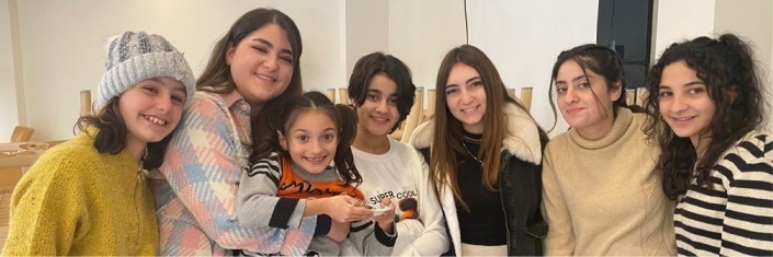 Group of seven Lebanese teen girls posing