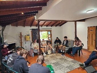 Bible study group in prayer in Colombia