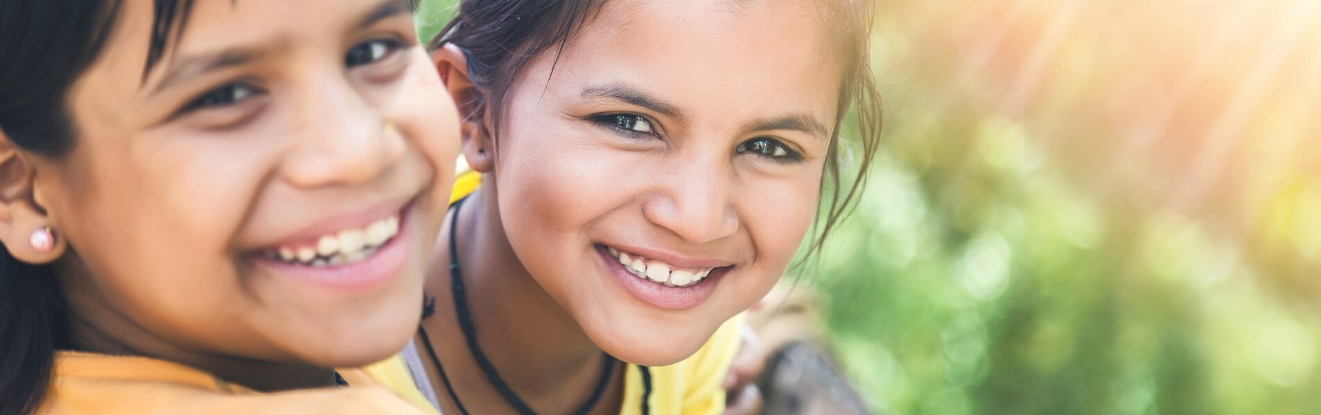 Two girls smiling